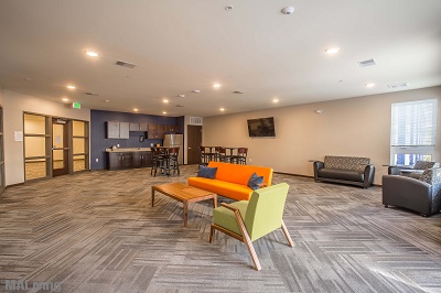 Veritas Village - Tastefully Decorated Community Room with Seating & Kitchenette