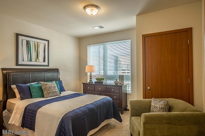 Veritas Village - Carpeted Bedrooms